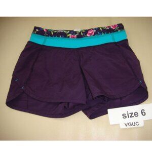 Ivivva by Lululemon🍋 Relay Shorts with flowery waistline eggplant colour size 6